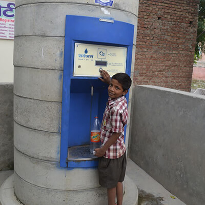 child-filling-safe-water