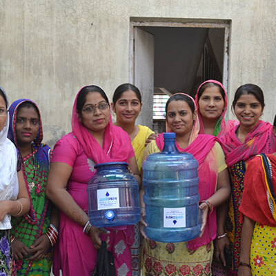 women-holding-sarvajal-water-jug-1