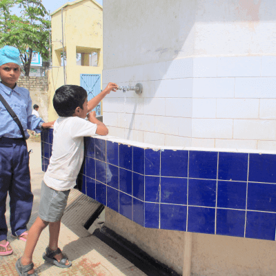 child-drinking-clean-water