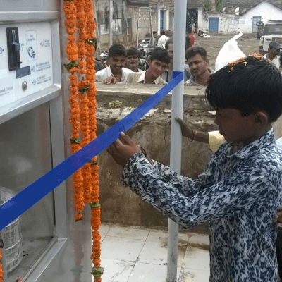 water-atm-inauguration-by-child