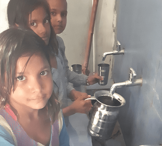 children-filling-water