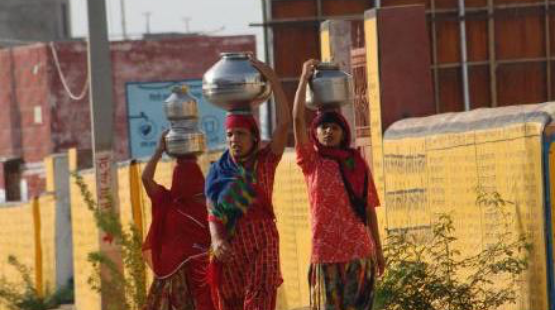 women-taking-water